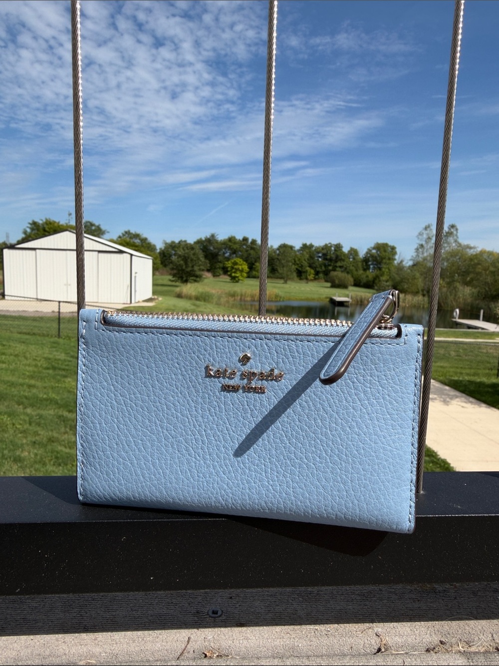kate spade light blue pebbled leather zip wristlet